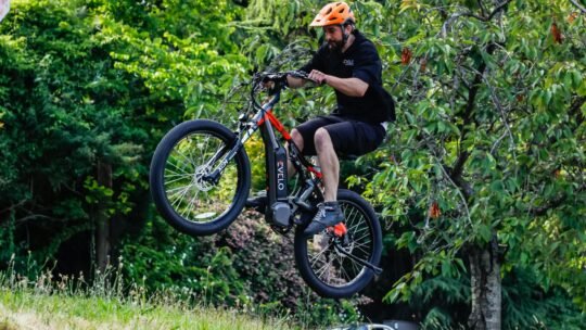 Energetic ride with an electric bike in a lush Seattle park.