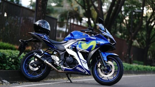 Blue Yamaha YZF-R3 sport motorcycle parked on a city street in Tangerang, Indonesia.