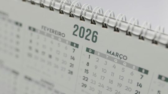 Close-up view of a 2026 spiral-bound desk calendar showing February and March.