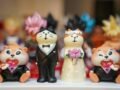 Collection of adorable animal figurines dressed as bride and groom, ideal for weddings or ornament displays.