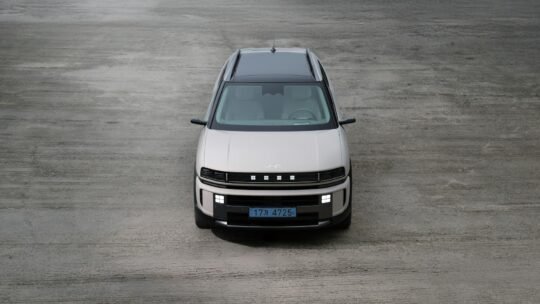 A Hyundai fuel cell vehicle parked outdoors showcasing modern design and clean energy technology.