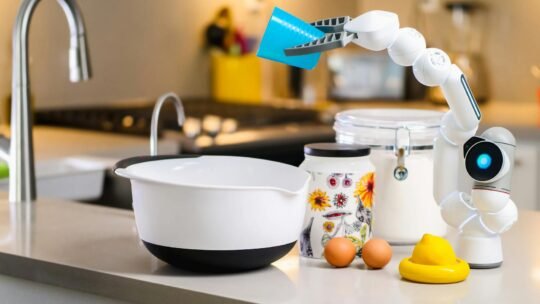 A robotic arm assists with mixing ingredients in a modern kitchen, showcasing advanced home technology.